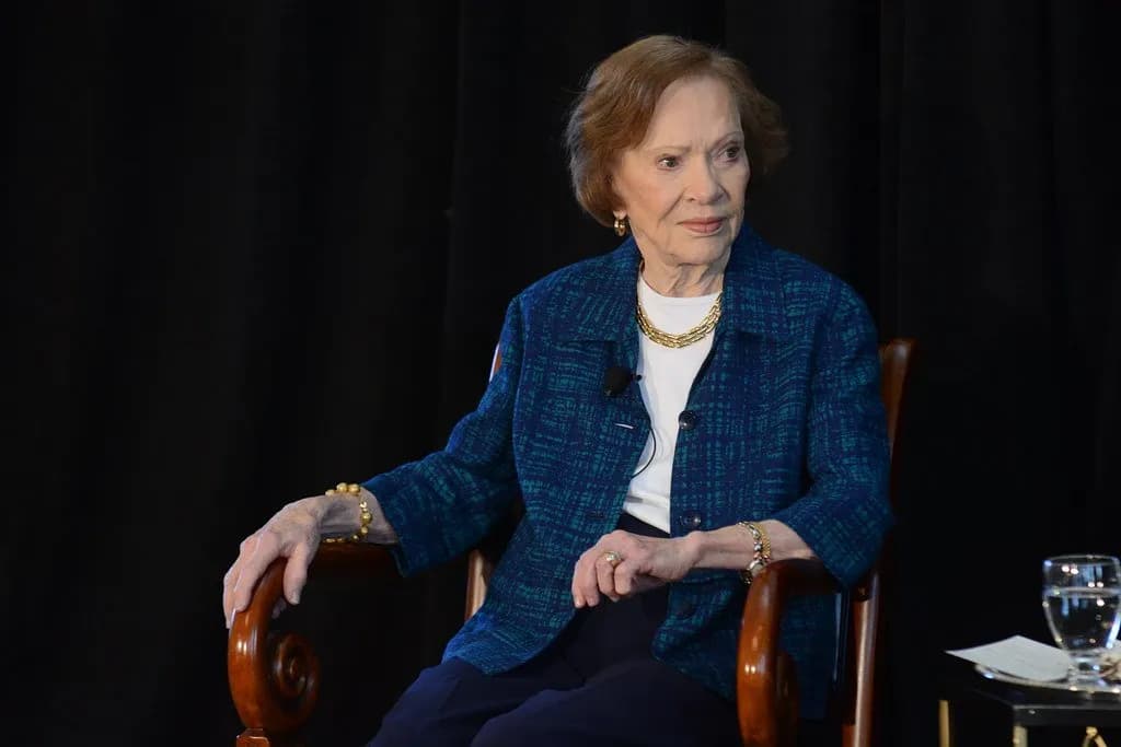 Rosalynn Carter seated in spotlight for her fearless work in dismantling mental health stigma